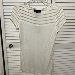 Classic white shirt with illusion neckline. New with tags. Size S. very soft